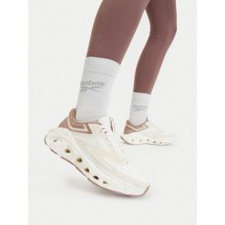 Buty do biegania Reebok. Białe obuwie sportowe damskie Reebok, bez wzorów, do biegania. Za 349.99 zł.