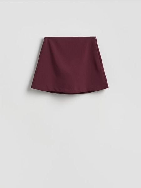 Spódnico-szorty z dodatkiem wiskozy - burgundowy. Czerwone szorty damskie Reserved, l, bez wzorów, z tkaniny. Za 99.99 zł.