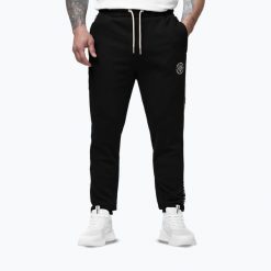 Spodnie męskie Pitbull Nexus Track. Czarne spodnie sportowe męskie PITBULL, m, bez wzorów, na fitness i siłownię. Za 239.99 zł.