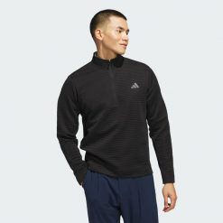 Zakładana przez głowę bluza Ultimate365 Dwr Textured Quarter Zip. Czarne bluzy męskie Adidas, bez wzorów, z materiału, bez kaptura, na golfa. Za 329.00 zł.