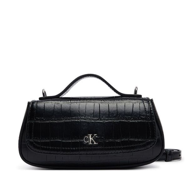 Torebka Calvin Klein. Czarne torebki do ręki damskie Calvin Klein, bez wzorów, klasyczne, bez dodatków. Za 449.99 zł.