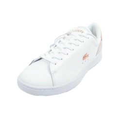 Trampki Damskie Skóra Carnaby. Białe trampki i tenisówki damskie Lacoste, bez wzorów, ze skóry, bez zapięcia. Za 664.99 zł.