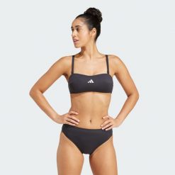 Koszulka typu bandeau Iconisea Padded. Białe t-shirty damskie Adidas, bez wzorów, z elastanu, klasyczne, bez kołnierzyka. Za 184.30 zł.
