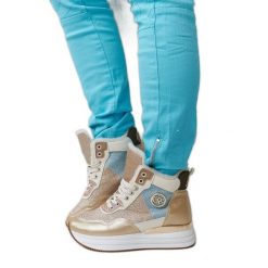 Złote ocieplane sneakersy z brokatem Deleon złoty. Żółte botki damskie na zimę, eleganckie, z okrągłym noskiem, przed kolano, bez obcasa, bez zapięcia. Za 169.07 zł.