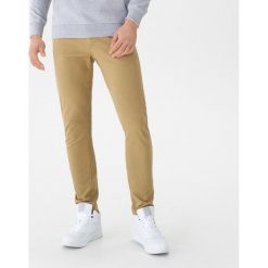 Spodnie skinny - Beżowy. Spodnie materiałowe męskie marki House. W wyprzedaży za 39.99 zł.