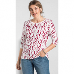 Koszulka w kolorze białym. Białe t-shirty damskie Sheego, z okrągłym kołnierzem. W wyprzedaży za 56.95 zł.