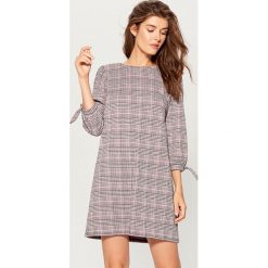 Sukienka mini w kratkę - Różowy. Czerwone sukienki damskie Mohito, w kratkę. Za 99.99 zł.