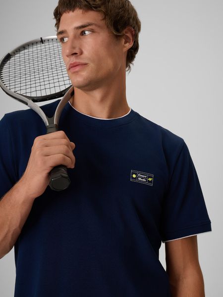 4F T-shirt regular gładki męski - granatowy M. Niebieskie koszulki sportowe męskie 4f, m, bez wzorów, z bawełny, bez kołnierzyka, bez ramiączek, tenisowe. Za 69.99 zł.