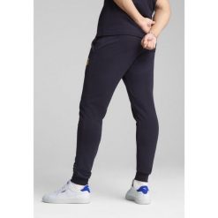 Męskie spodnie dresowe PUMA Class PUMA New Navy Blue. Niebieskie buty sportowe męskie Puma, z dresówki, bez zapięcia, na fitness i siłownię. W wyprzedaży za 109.00 zł.