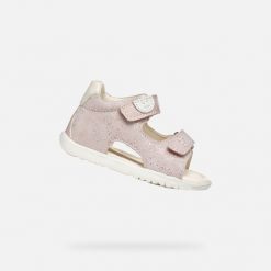 Sandały Geox Model B Sandal Macchia Gir Kolor Rose. Białe sandały damskie Geox, bez wzorów, ze skóry, bez obcasa, bez zapięcia. Za 205.99 zł.