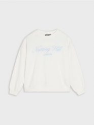 Bluza z napisem - kremowy. Białe bluzy damskie Sinsay, l, bez wzorów, bez kaptura. W wyprzedaży za 19.99 zł.
