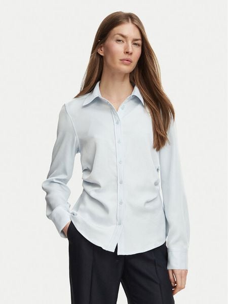 Calvin Klein Koszula LV044H110G Niebieski jasny Regular Fit. Niebieskie bluzki damskie Calvin Klein, m, bez wzorów, biznesowe, bez kołnierzyka, bez ramiączek. Za 449.99 zł.