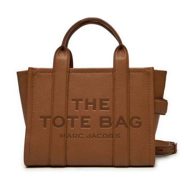 Torebka Marc Jacobs. Brązowe torebki do ręki damskie Marc Jacobs, bez wzorów, klasyczne, bez dodatków. Za 2,049.00 zł.