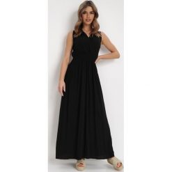 Czarna Sukienka Clymiolea. Czarne sukienki damskie Born2be, m, bez wzorów, z tkaniny, eleganckie, bez kołnierzyka, bez ramiączek, maxi, kopertowe. Za 54.99 zł.