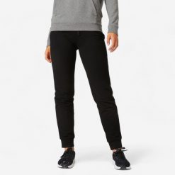 Spodnie dresowe damskie Nyamba Gym & Pilates 500 regular. Czarne spodnie dresowe damskie DOMYOS, l, bez wzorów, z bawełny. Za 29.99 zł.