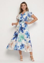 Niebieska Sukienka w Kwiaty o Kopertowym Kroju z Wiązanym Paskiem Redanae. Niebieskie sukienki damskie Born2be, na co dzień, l, bez wzorów, eleganckie, bez kołnierzyka, bez ramiączek, maxi, kopertowe. Za 84.99 zł.