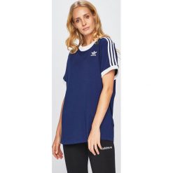 Adidas Originals - Top. Niebieskie t-shirty damskie adidas Originals, bez wzorów, z bawełny, casualowe, bez kołnierzyka. W wyprzedaży za 99.90 zł.