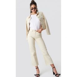 NA-KD Trend Spodnie z surowym wykończeniem - Beige. Spodnie materiałowe damskie marki NA-KD Trend. Za 202.95 zł.