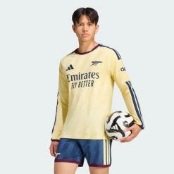 Oryginalna koszulka z trzeciego zestawu z długim rękawem Arsenal FC 26/27. Żółte koszulki sportowe męskie Adidas, xs, bez wzorów, z dzianiny, bez kołnierzyka, bez ramiączek, do piłki nożnej, climacool (adidas). Za 699.00 zł.