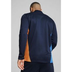 Męska bluza treningowa Olympique Marsylia z zamkiem 1/4 PUMA. Brązowe bluzy męskie Puma, m, bez wzorów, bez kaptura, na fitness i siłownię. W wyprzedaży za 289.00 zł.