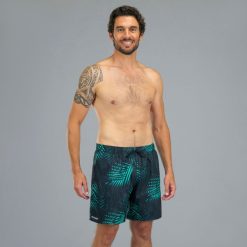 Spodenki surfingowe męskie Olaian 100 Palm 15". Niebieskie kąpielówki męskie OLAIAN, m, bez wzorów, z materiału, krótkie. Za 49.99 zł.
