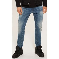 Jeansy slim fit - Niebieski. Niebieskie jeansy męskie House. Za 129.99 zł.