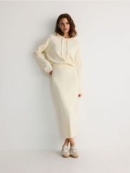 Spódnica midi - kremowy. Białe spódnice damskie Reserved, l, bez wzorów, midi. W wyprzedaży za 39.99 zł.