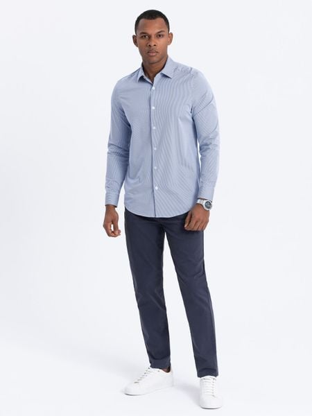 Spodnie męskie chino o dopasowanym kroju - ciemnoniebieskie V4 - Rozmiar: S. Niebieskie spodnie materiałowe męskie Ombre Clothing, m, bez wzorów, z bawełny. Za 299.99 zł.