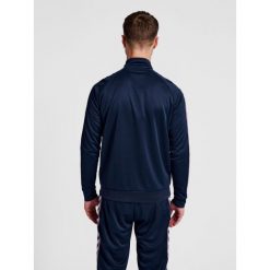 Bluza dresowa zapinana na zamek błyskawiczny Hummel IC Lerby Poly. Niebieskie bluzy męskie Hummel, m, bez wzorów, z dresówki, bez kaptura. Za 284.00 zł.