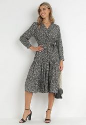 Czarna Sukienka Cillele. Czarne sukienki damskie Born2be, l, bez wzorów, z materiału, bez kołnierzyka, bez ramiączek, midi, dopasowane. Za 119.99 zł.