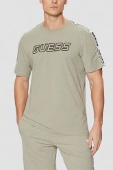 GUESS Zielony t-shirt męski Arlo, Rozmiar M. Zielone t-shirty męskie Guess, l, z aplikacjami, bez kołnierzyka. W wyprzedaży za 109.99 zł.