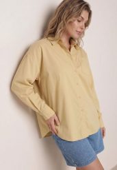 Żółta Bawełniana Koszula o Kroju Oversize Nororena. Żółte bluzki damskie Born2be, l, bez wzorów, z bawełny, eleganckie, bez kołnierzyka, bez ramiączek. Za 89.99 zł.