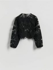 Bluzka z haftowanym wzorem - czarny. Czarne bluzki damskie Reserved, l, bez wzorów, z dzianiny, bez kołnierzyka, bez ramiączek. Za 159.99 zł.