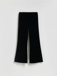 Welurowe spodnie - czarny. Czarne spodnie materiałowe damskie Reserved, l, bez wzorów, z dzianiny. Za 279.99 zł.