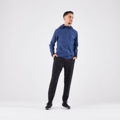 Spodnie do biegania męskie Kiprun Run 100 Dry. Czarne spodnie sportowe męskie KIPRUN, l, bez wzorów, z materiału, do biegania. Za 89.99 zł.