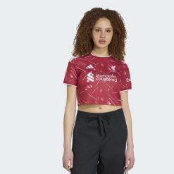 Koszulka podstawowa o skróconym fasonie Liverpool FC 26/27 Crop. Czerwone t-shirty damskie Adidas, l, bez wzorów, z dzianiny, klasyczne, bez kołnierzyka. Za 369.00 zł.