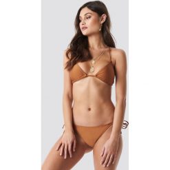 NA-KD Swimwear Dół bikini Shiny Triangle - Copper. Bikini damskie marki NA-KD Swimwear. Za 32.00 zł.