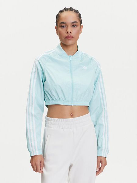 Adidas Bluza adicolor Teamgeist JD0267 Turkusowy Slim Fit. Niebieskie bluzy damskie Adidas, s, bez wzorów, z syntetyku, bez kaptura. Za 218.99 zł.
