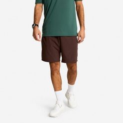 Spodenki fitness cardio męskie Domyos. Brązowe krótkie spodenki sportowe męskie DOMYOS, m, bez wzorów, z materiału, do biegania. Za 79.99 zł.