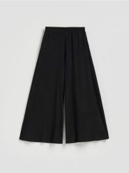 Spodnie palazzo - czarny. Czarne spodnie materiałowe damskie Reserved, l, bez wzorów, z dzianiny. Za 119.99 zł.