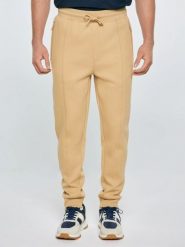 Spodnie męskie dresowe beżowe Wladorp 801. Brązowe spodnie sportowe męskie Big Star, l, bez wzorów, z dresówki. Za 199.99 zł.