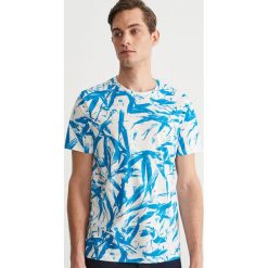 Wzorzysty T-shirt - Kremowy. T-shirty damskie Reserved. W wyprzedaży za 39.99 zł.