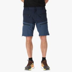 Szorty turystyczne męskie Swedemount Lofoten Stretch Shorts szybkoschnące. Niebieskie krótkie spodenki sportowe męskie SWEDEMOUNT, m, bez wzorów, z tkaniny, trekkingowe. Za 245.00 zł.