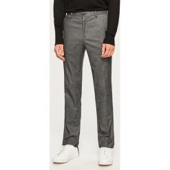 Spodnie na kant slim fit - Szary. Eleganckie spodnie męskie marki Giacomo Conti. W wyprzedaży za 119.99 zł.