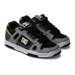 Buty na deskorolkę męskie DC Stag. Szare buty sportowe męskie DC Shoes, z materiału, bez zapięcia, trekkingowe. Za 351.45 zł.