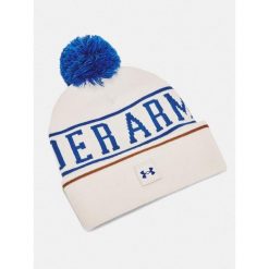 Czapka zimowa męska Under Armour ciepła z pomponem. Białe czapki i kapelusze męskie Under Armour, na zimę, bez wzorów, sportowe. Za 69.99 zł.