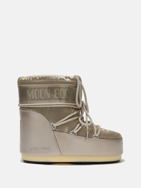 Śniegowce damskie Moon Boot ICON LOW GLANCE PLATINUM SATIN BOOTS. Szare śniegowce i trapery damskie Moon Boot. W wyprzedaży za 799.20 zł.