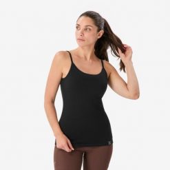 Koszulka na ramiączka trekkingowa damska Merino. Czarne koszulki sportowe damskie SIMOND, l, bez wzorów, z materiału, bez kołnierzyka, bez ramiączek, trekkingowe. Za 99.99 zł.