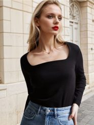 Koszulka z długimi rękawami - czarny. Czarne t-shirty damskie Sinsay, l, bez wzorów, bez kołnierzyka. W wyprzedaży za 9.99 zł.