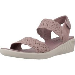 Sandały SKECHERS ARYA Fioletowy. Fioletowe sandały damskie Skechers, bez wzorów, z tkaniny, bez obcasa, bez zapięcia. Za 217.99 zł.